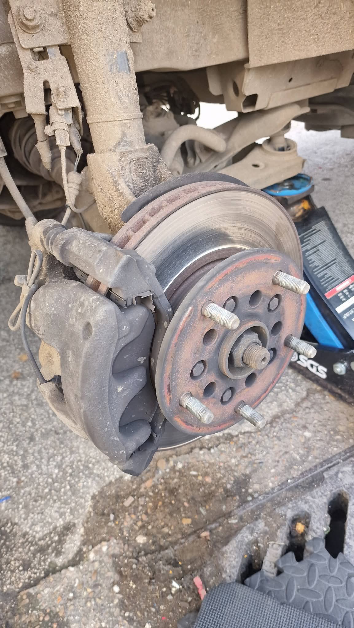 Worn brake disc before replacement